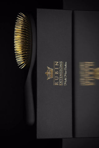 Goldene Extensions Spezial Haarbürste.